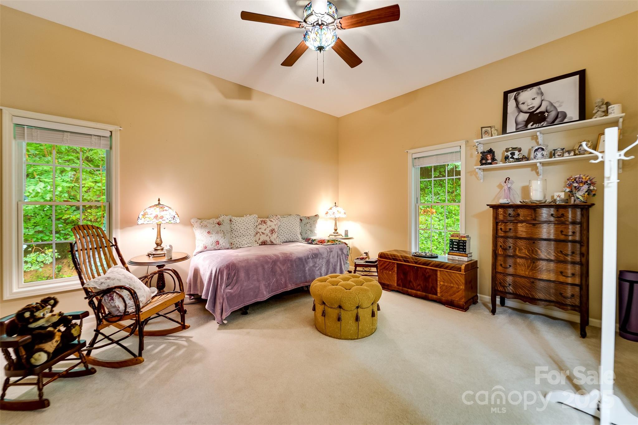 1838 Coman Road Franklin, NC 28734 - Photo 28 of 48 a bed room with furniture and a window