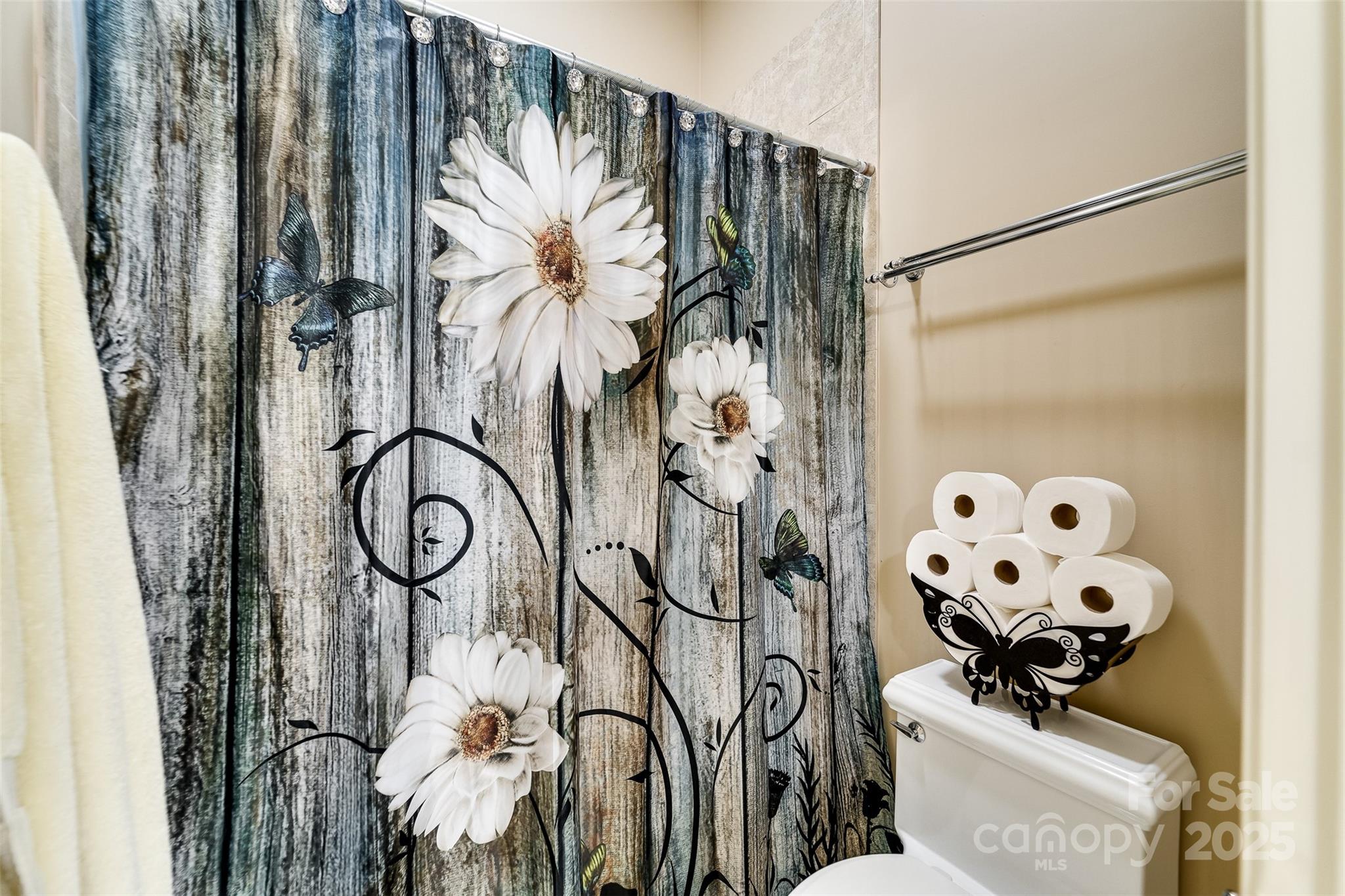 1838 Coman Road Franklin, NC 28734 - Photo 32 of 48 a picture of a bathroom with a shower and a curtain