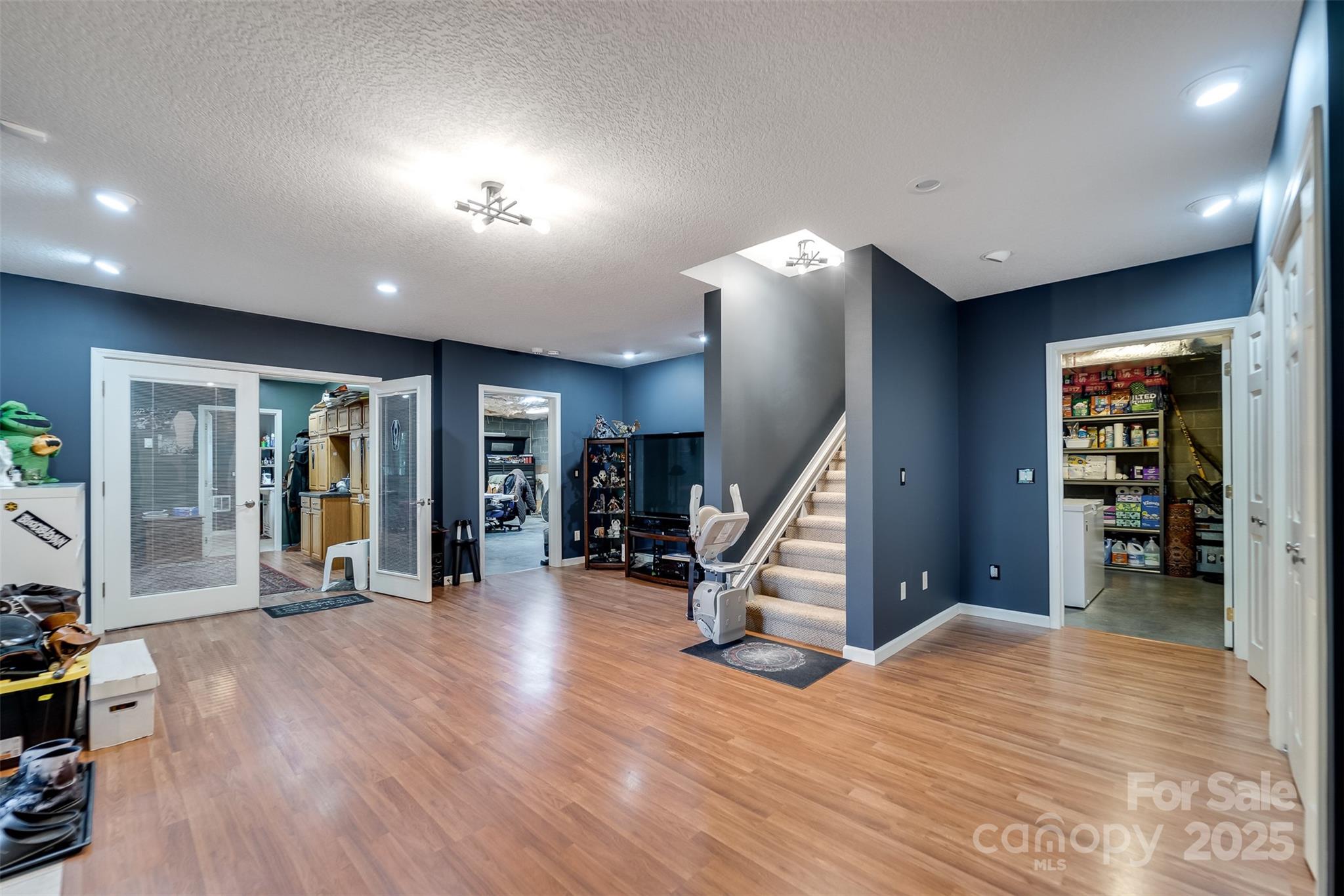 1838 Coman Road Franklin, NC 28734 - Photo 37 of 48 a view of a hall with stairs and a couch