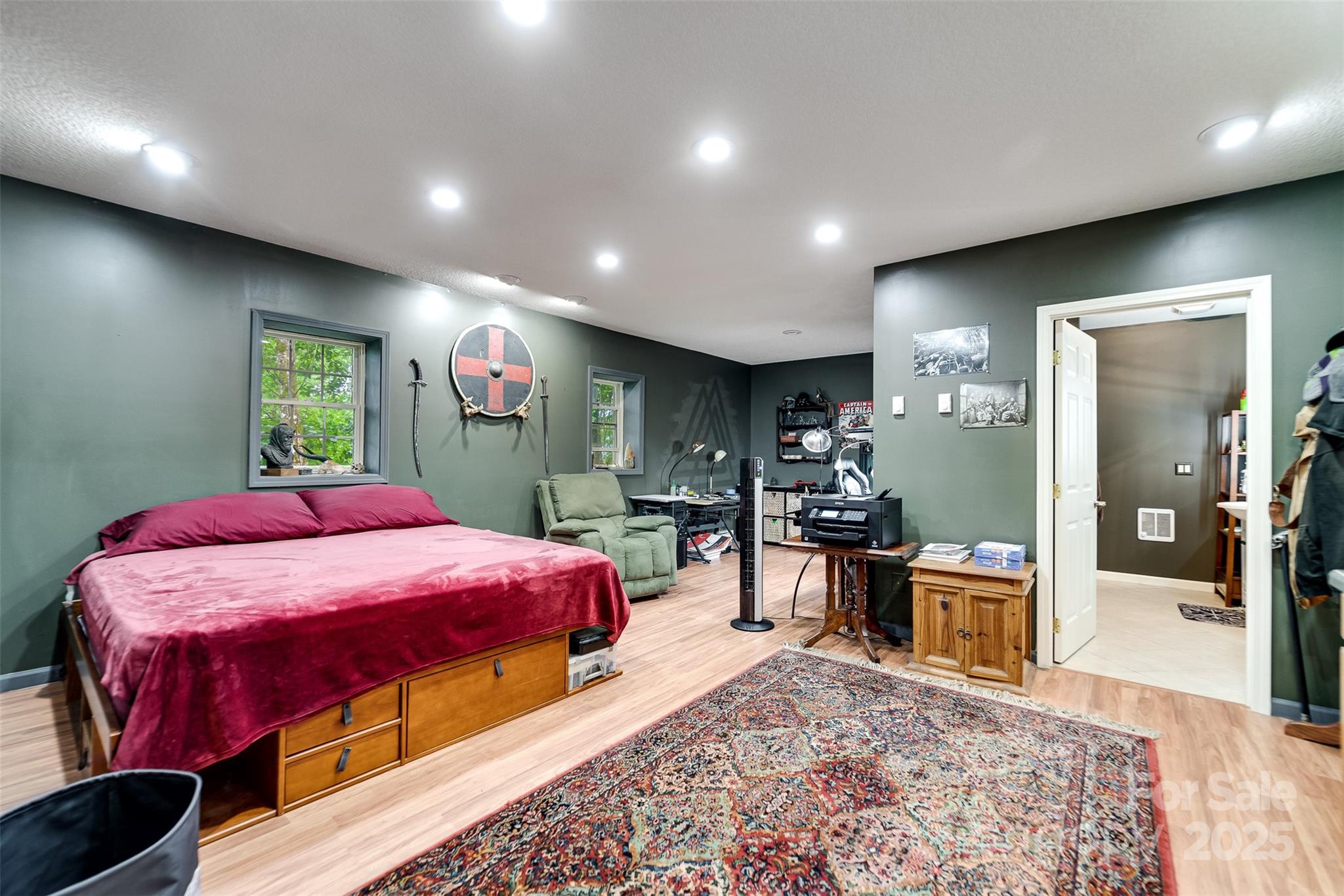 1838 Coman Road Franklin, NC 28734 - Photo 40 of 48 a bed room with a bed and mirror