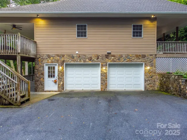 a view of a house with a garage