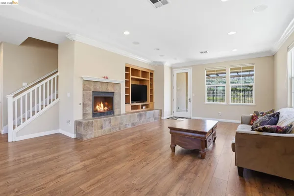 a view of livingroom with furniture window and wooden floor