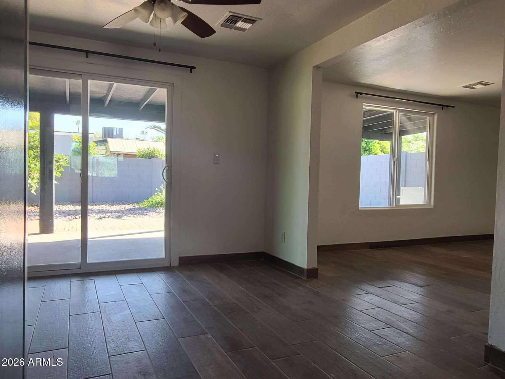 3702 East Thunderbird Road Phoenix, AZ 85032 - Photo 5 of 23 a view of an empty room and window