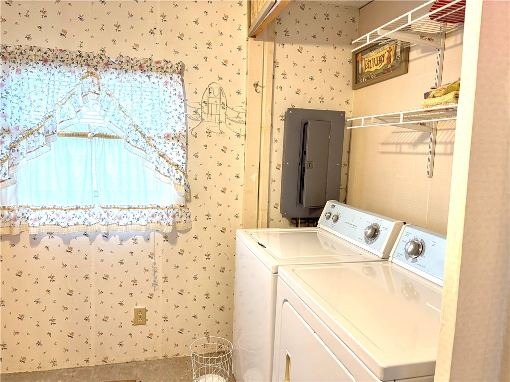5434 North Waynesville Road, Unit 15 Oregonia, OH 45054 - Photo 7 of 19 This dedicated laundry room offers practical convenience for daily chores.
