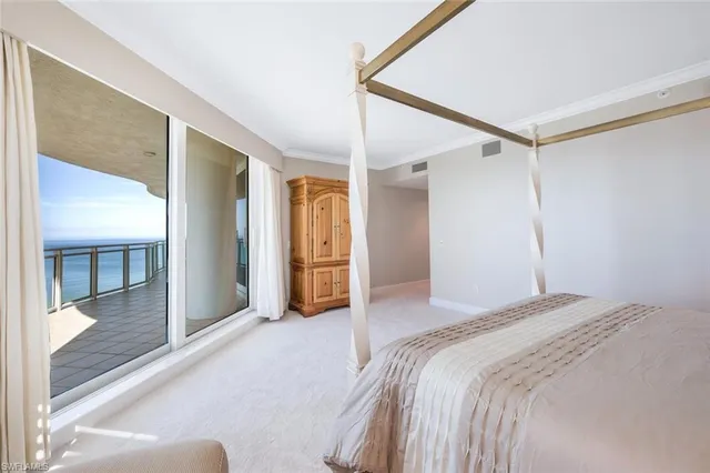 a bathroom with a tub a sink and mirror
