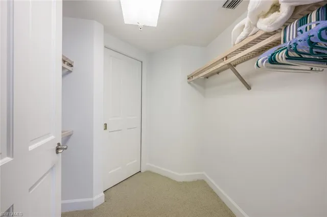 a bathroom with a sink toilet and mirror