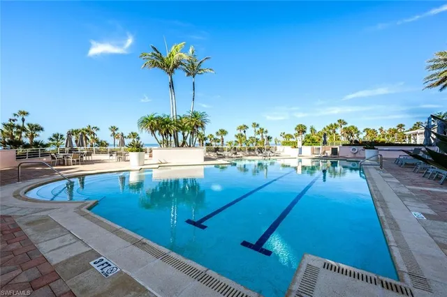 a kitchen with a table and chairs in it