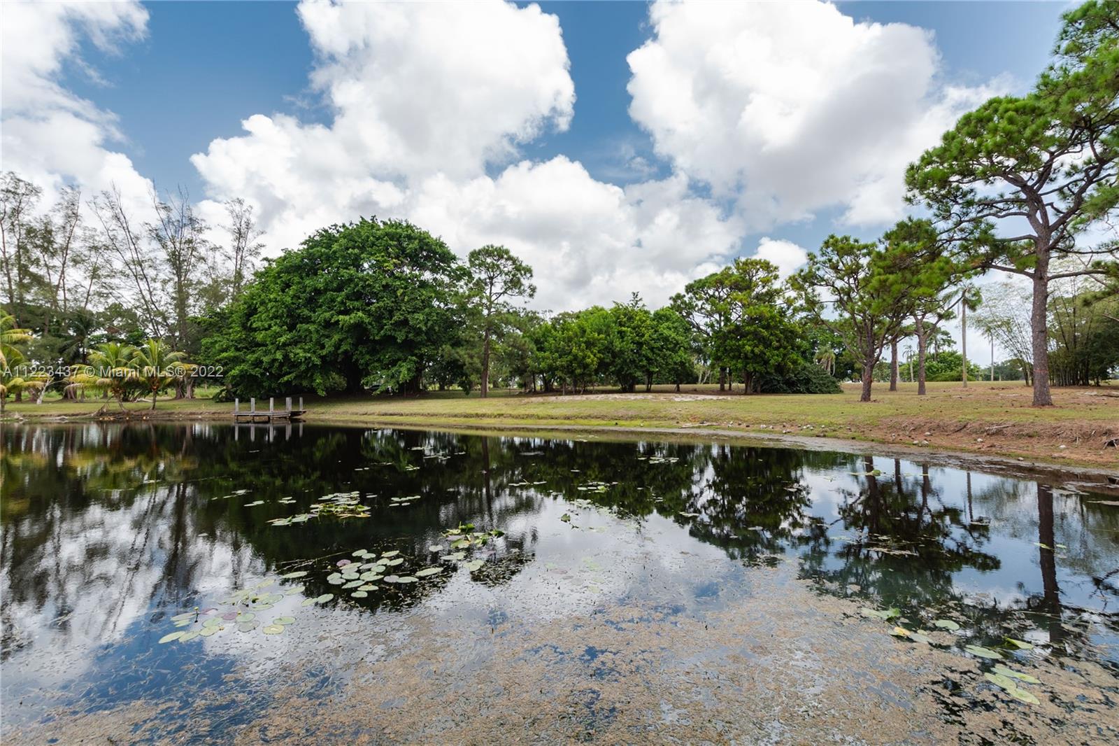 6017 Le Lac Road Boca Raton, FL 33496 - Photo 35 of 46 a view of a lake with outdoor space