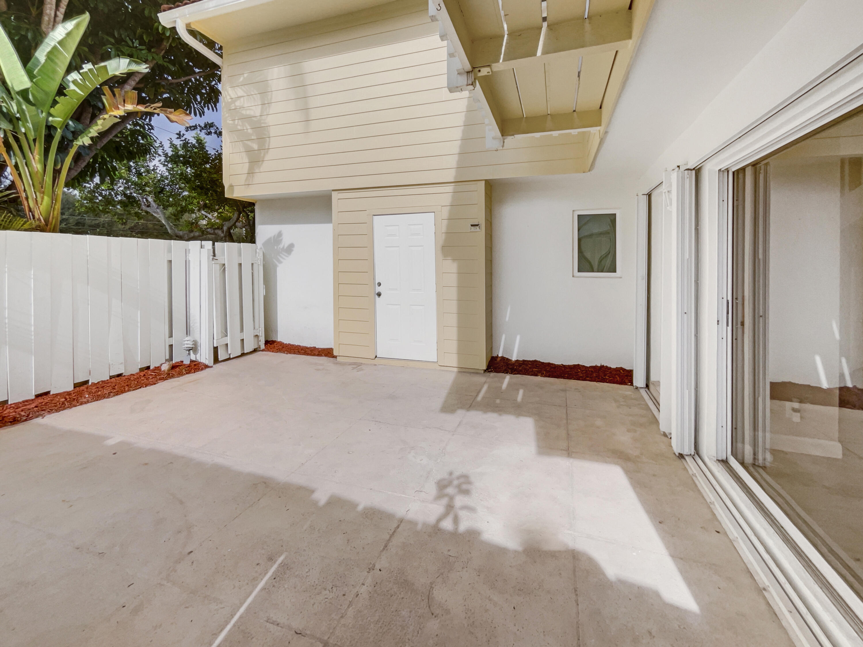 109 Seabreeze Circle Jupiter, FL 33477 - Photo 26 of 28 a view of a house with a outdoor space