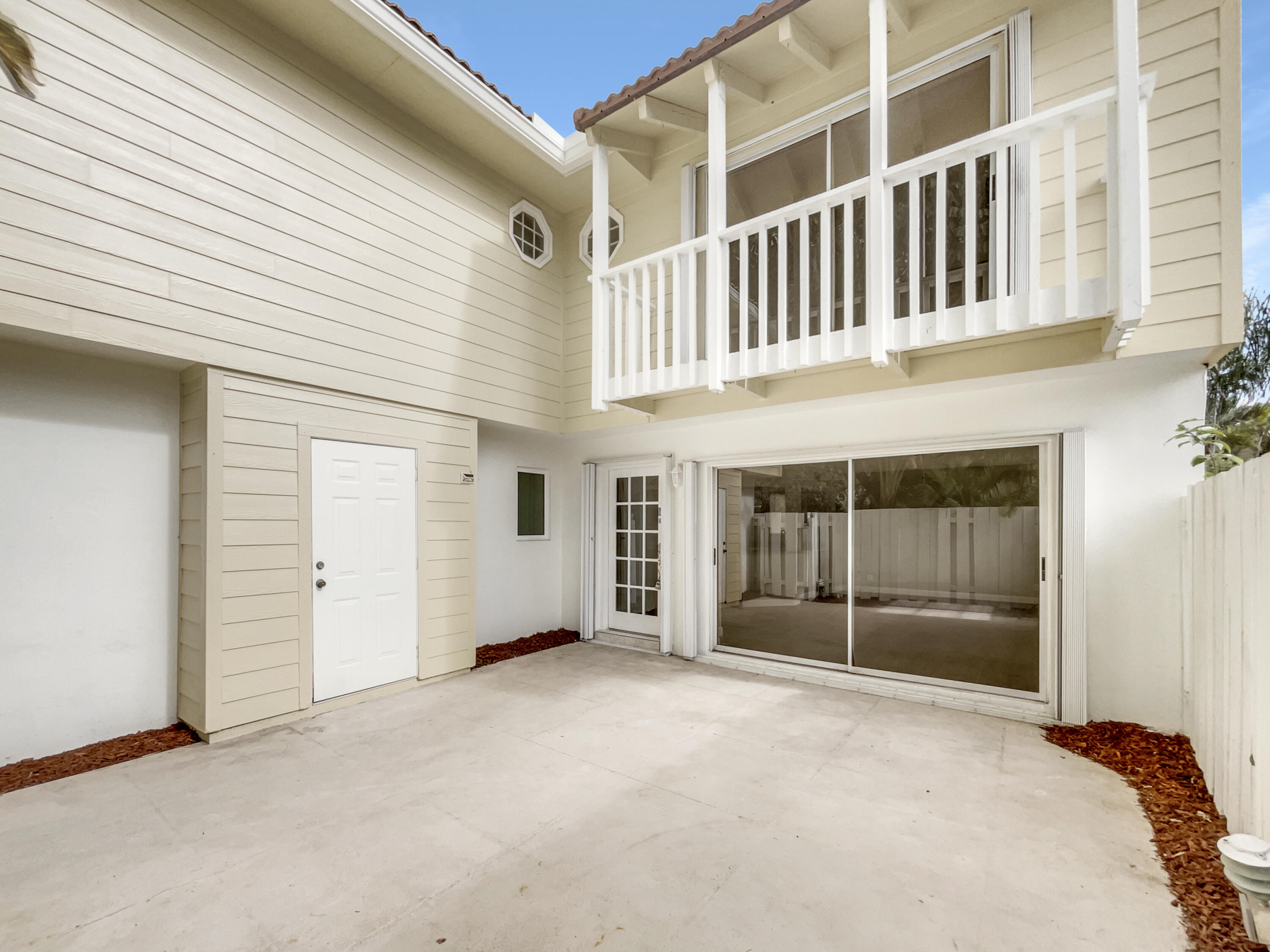 109 Seabreeze Circle Jupiter, FL 33477 - Photo 27 of 28 a view of an entrance to house