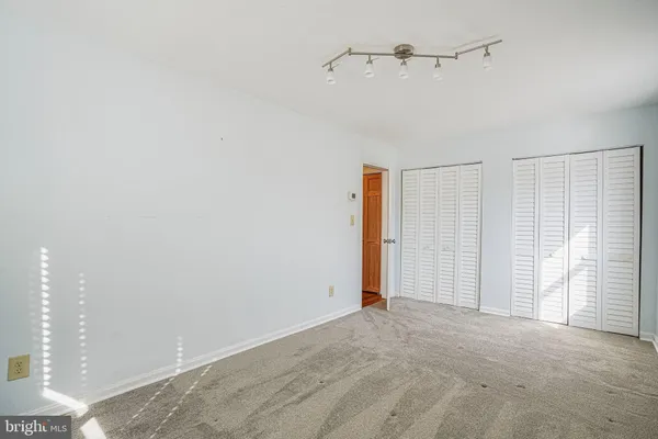 a view of a room with an empty space