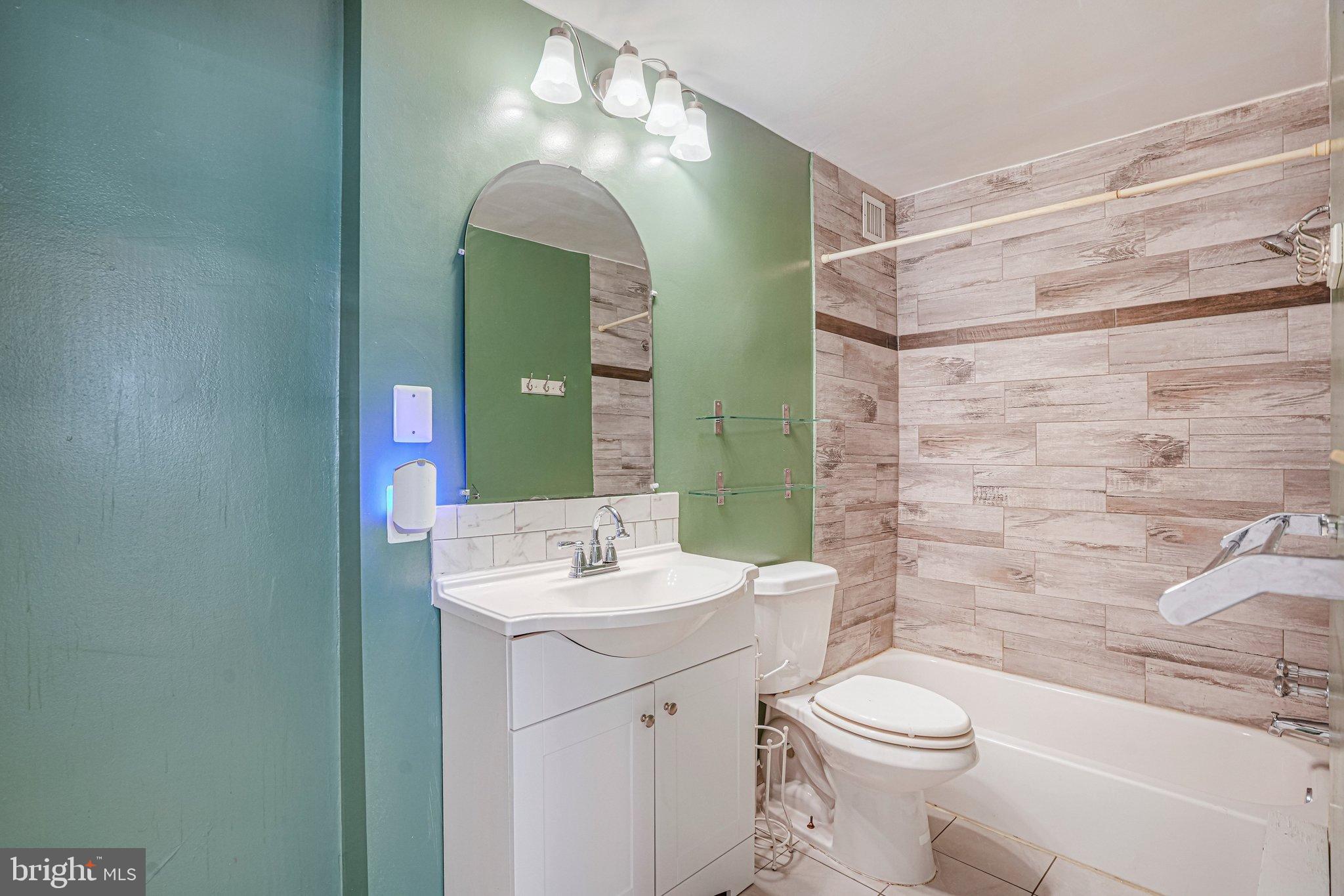 95 East Wayne Avenue, Unit 209 Silver Spring, MD 20901 - Photo 14 of 19 Updated full bathroom