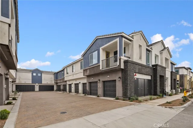 a front view of a house with garage