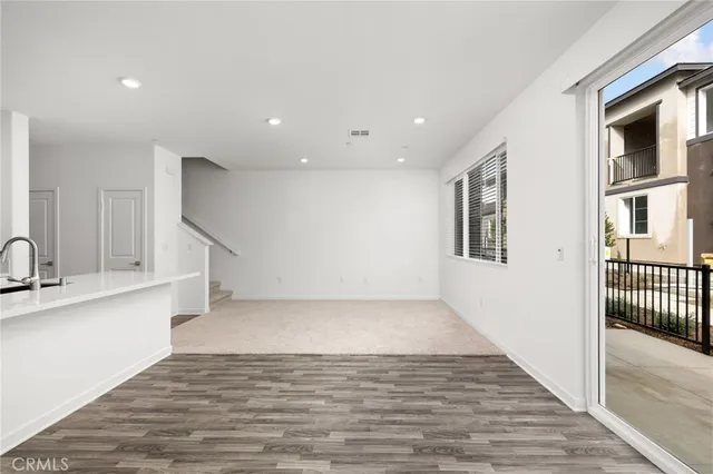 a view of a kitchen with a sink