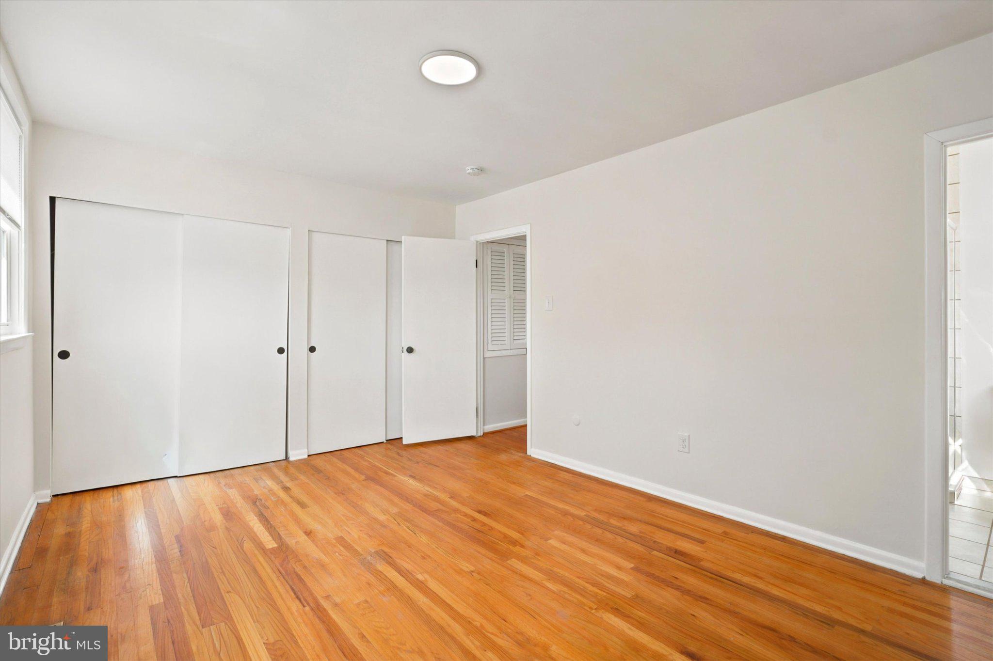 668 Renz Street Philadelphia, PA 19128 - Photo 10 of 25 Bright and airy space with hardwood floors.