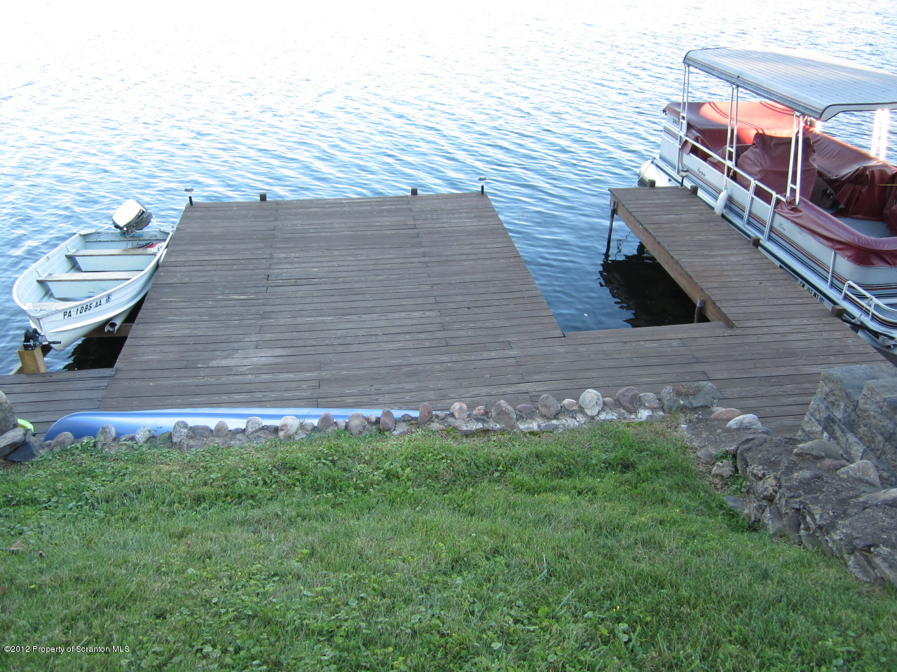 362 Point Road Lake Winola, PA 18419 - Photo 13 of 42 a view of a house with a backyard