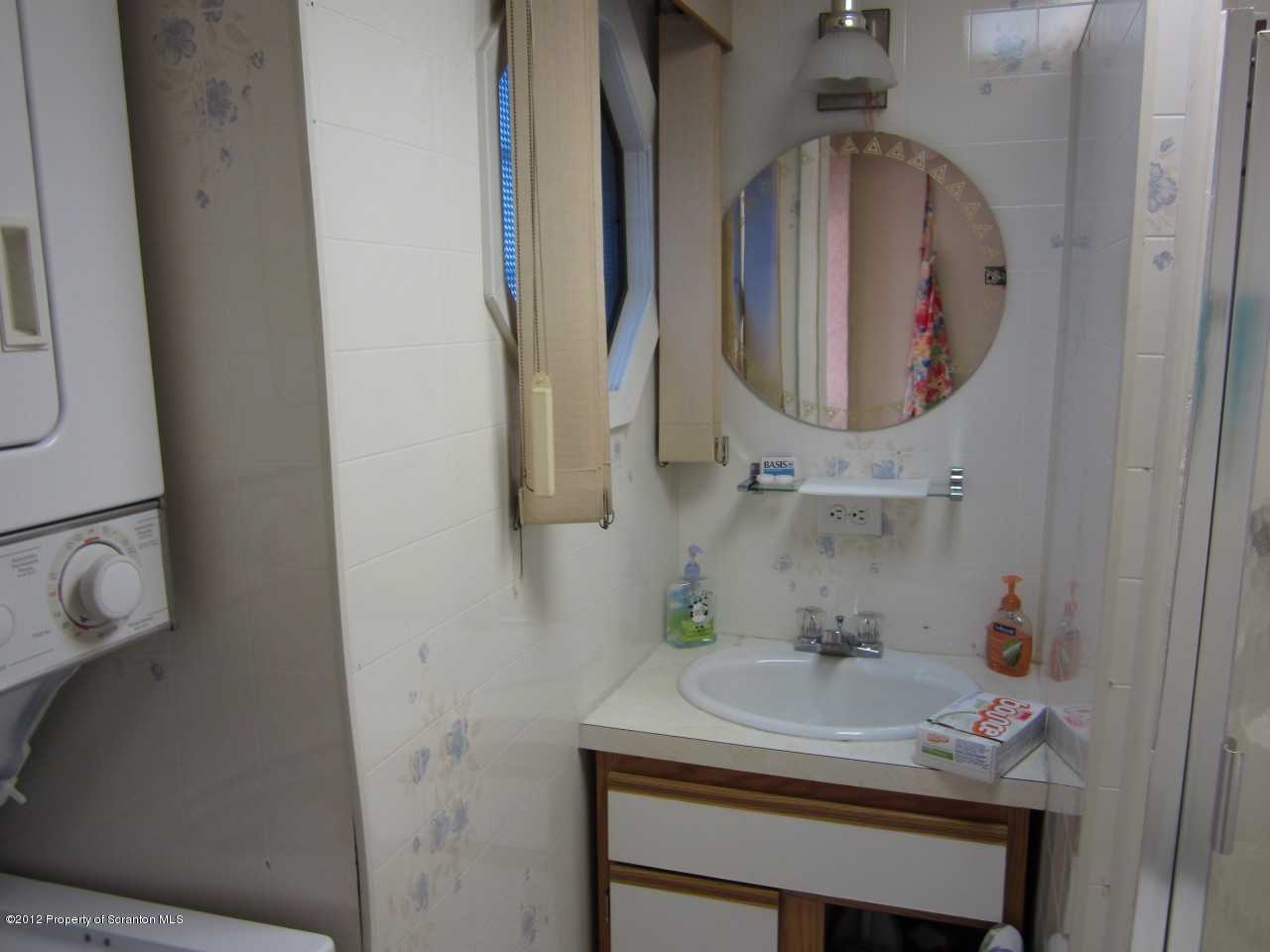 362 Point Road Lake Winola, PA 18419 - Photo 23 of 42 a bathroom with a sink and a mirror