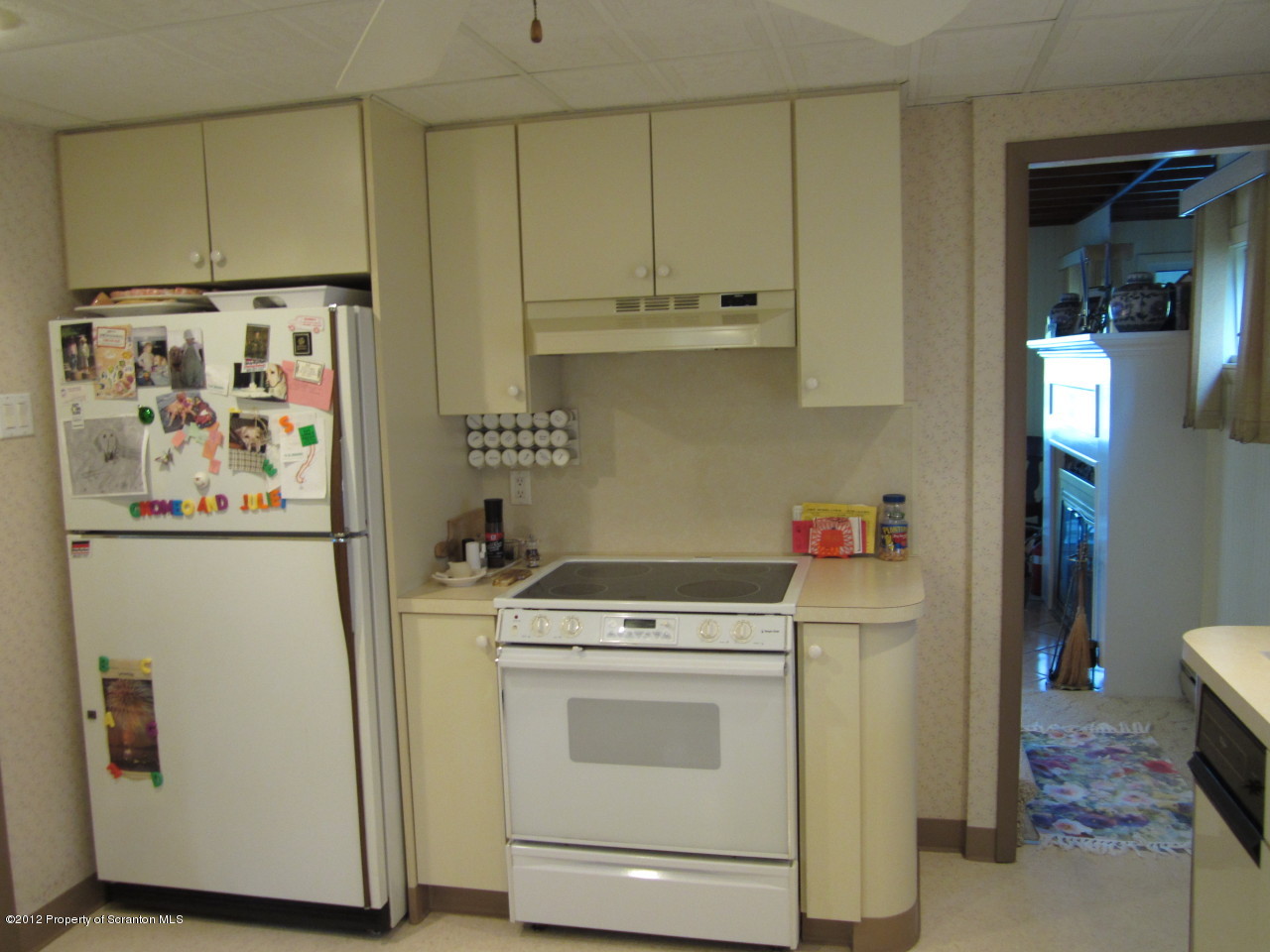 362 Point Road Lake Winola, PA 18419 - Photo 24 of 42 a kitchen with a white stove and refrigerator