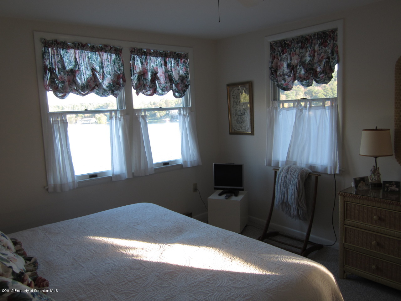 362 Point Road Lake Winola, PA 18419 - Photo 26 of 42 a bedroom with a bed and a window