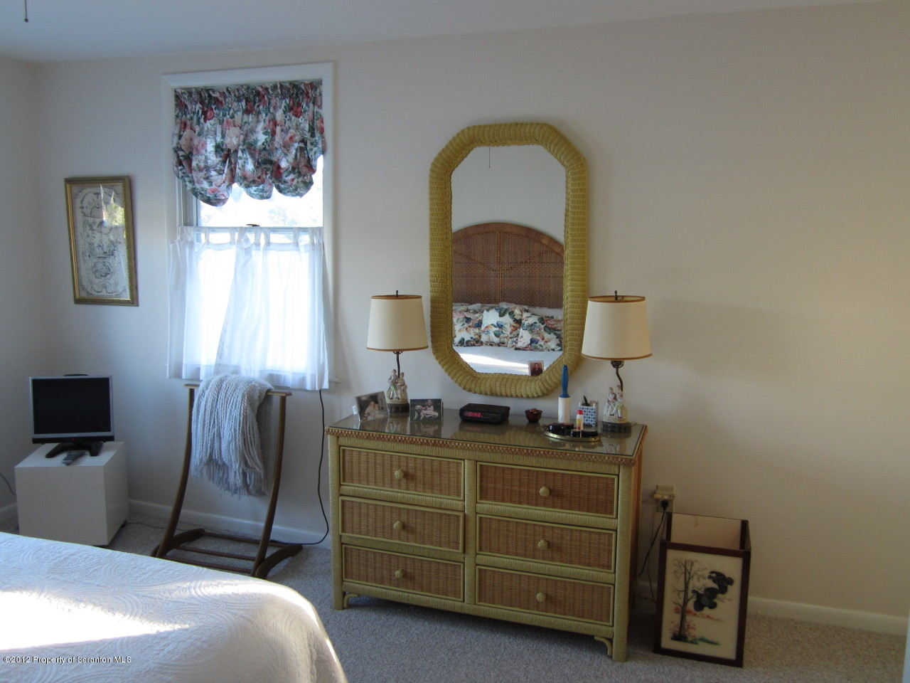 362 Point Road Lake Winola, PA 18419 - Photo 27 of 42 a bedroom with a bed and a dresser