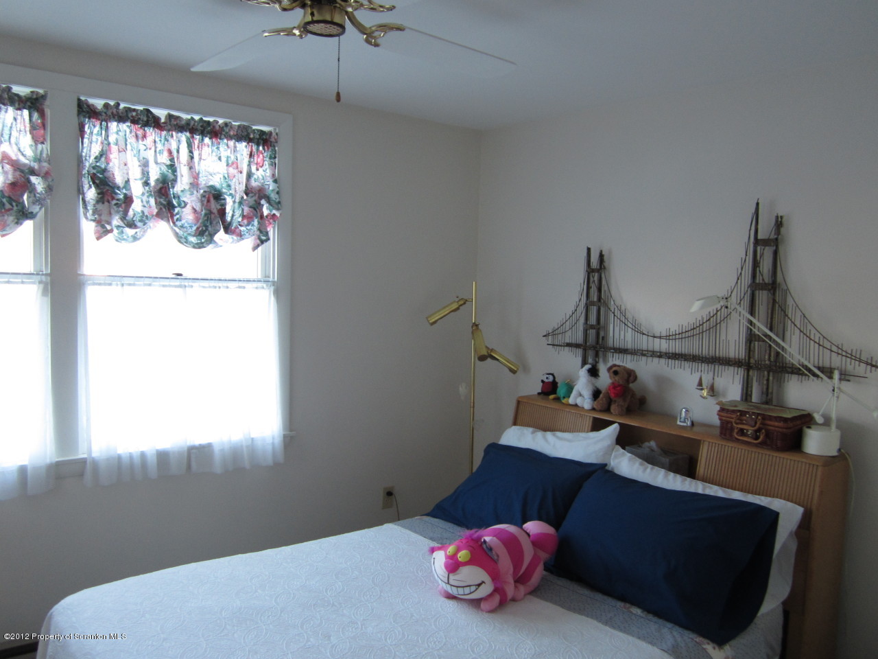 362 Point Road Lake Winola, PA 18419 - Photo 29 of 42 a bedroom with bed and window