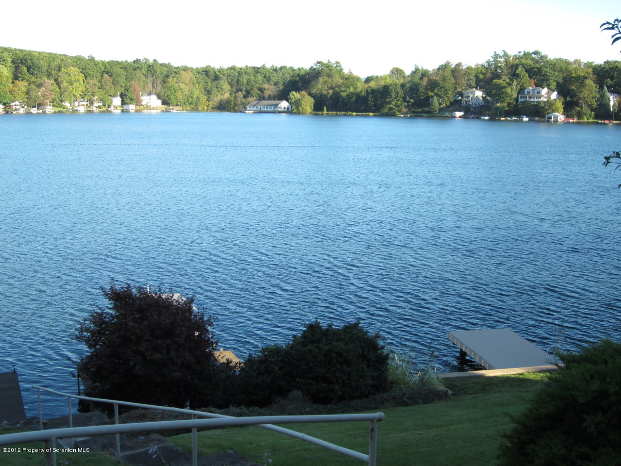 362 Point Road Lake Winola, PA 18419 - Photo 9 of 42 a view of a lake from a yard