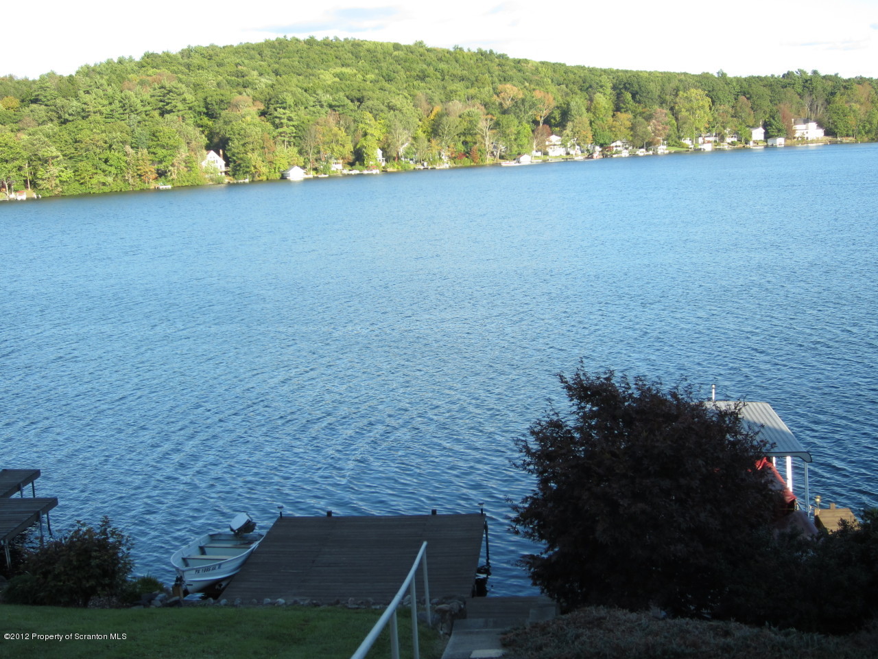 362 Point Road Lake Winola, PA 18419 - Photo 10 of 42 a view of a lake with mountain in the background