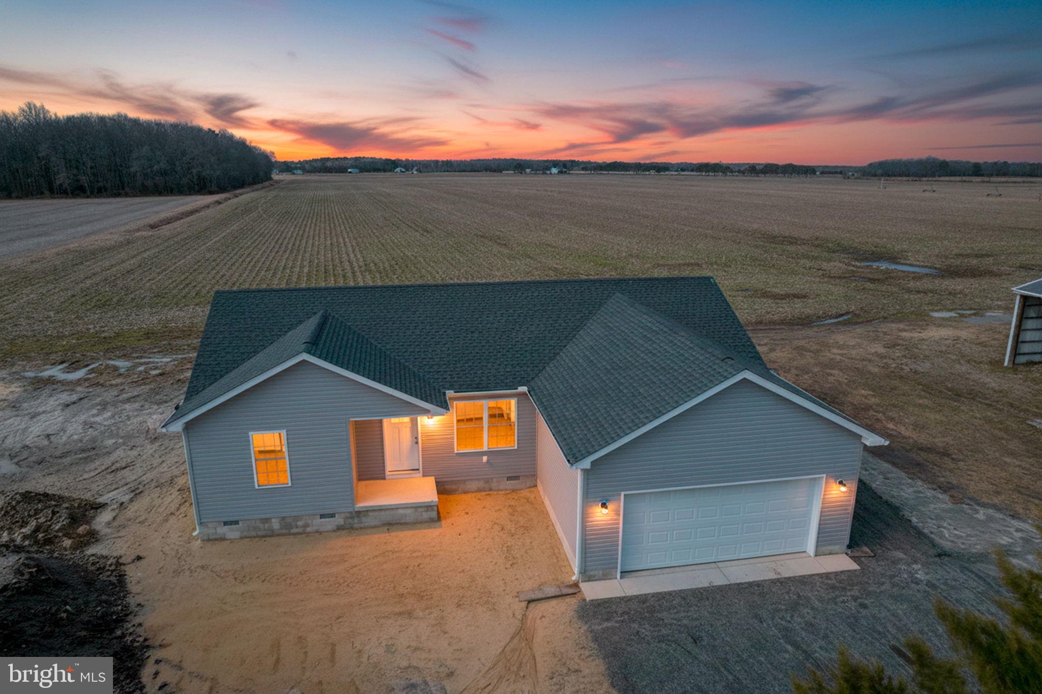 11064 North Union Church Road Lincoln, DE 19960 - Photo 1 of 35 a front view of a house with a yard