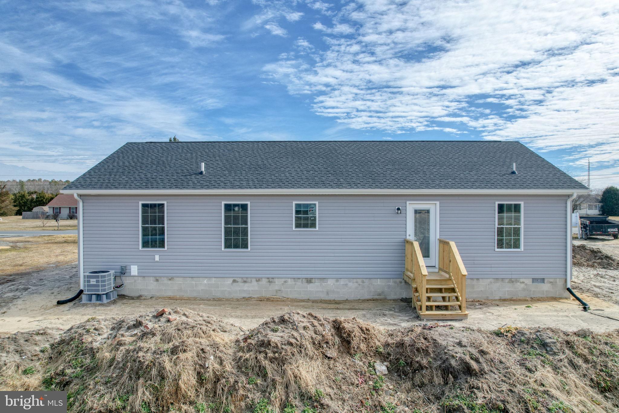 11064 North Union Church Road Lincoln, DE 19960 - Photo 11 of 35 a house with trees in the background