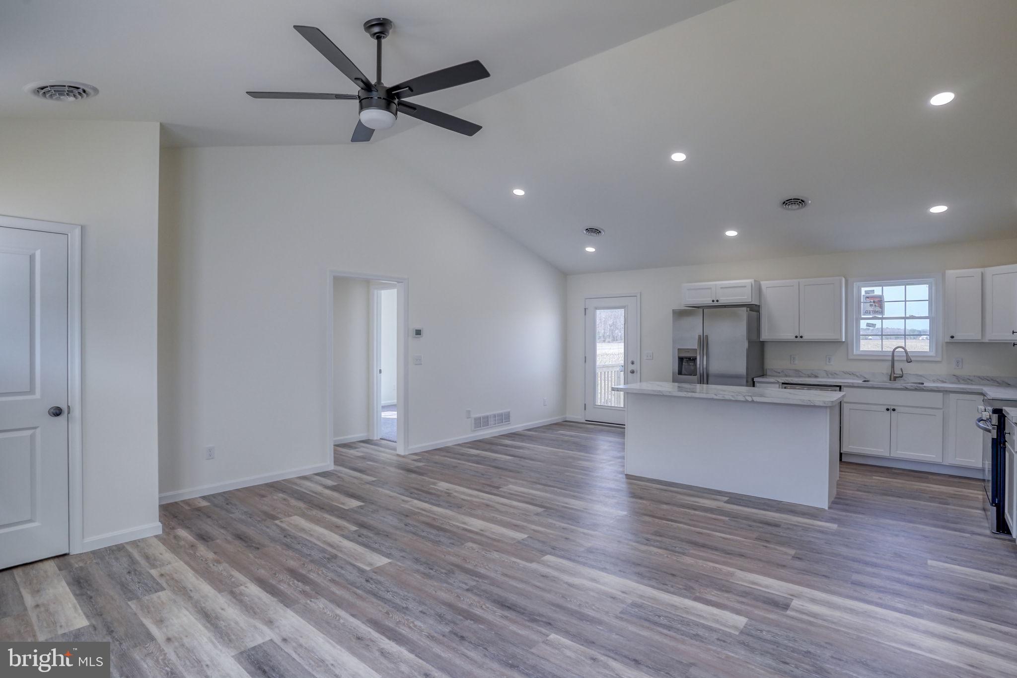 11064 North Union Church Road Lincoln, DE 19960 - Photo 13 of 35 a view of kitchen with sink microwave and refrigerator
