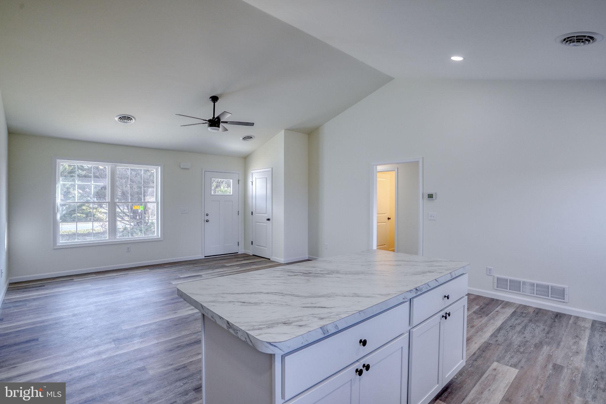 11064 North Union Church Road Lincoln, DE 19960 - Photo 20 of 35 an empty room with wooden floor and window