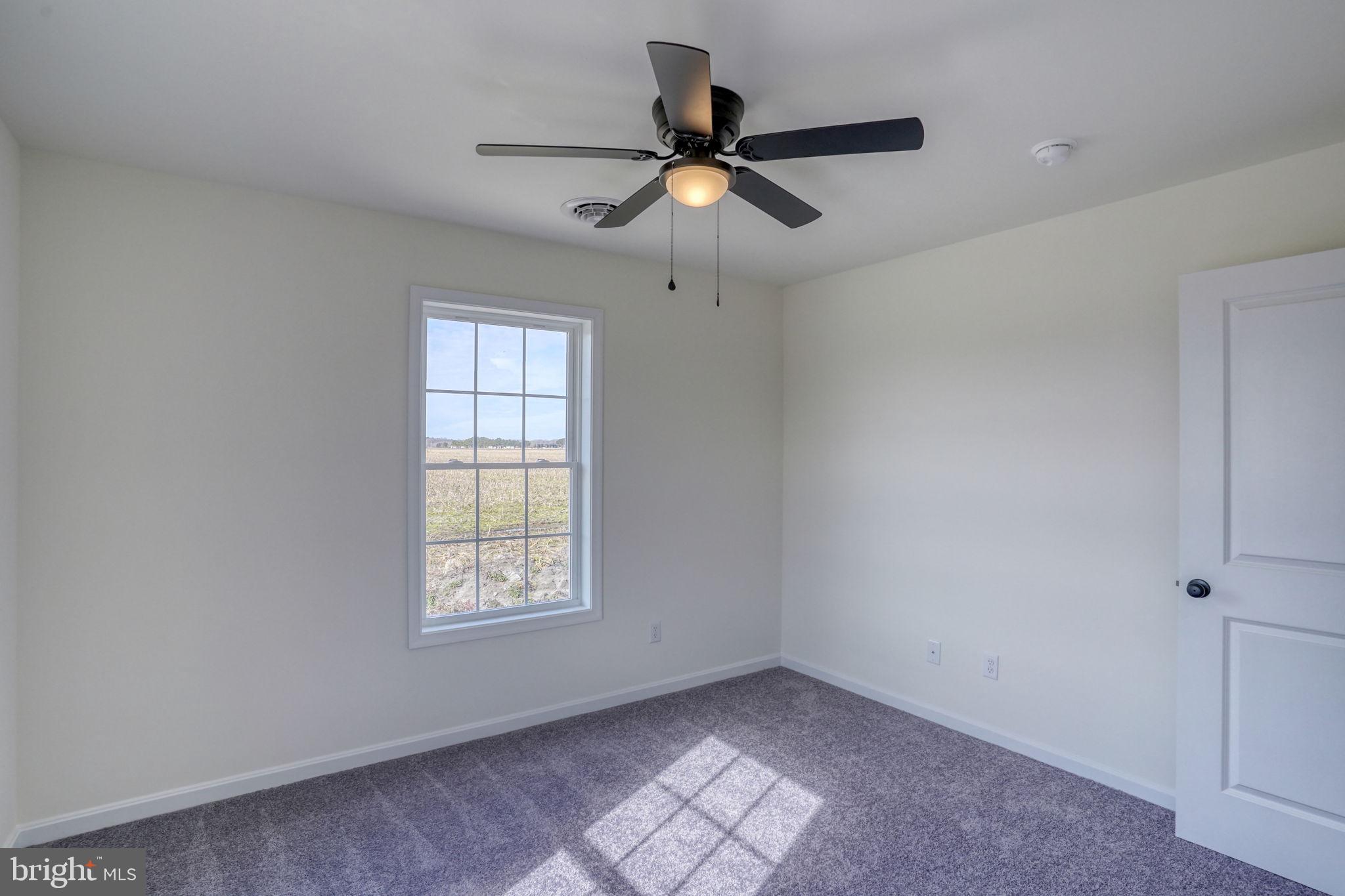 11064 North Union Church Road Lincoln, DE 19960 - Photo 24 of 35 a view of empty room with ceiling fan