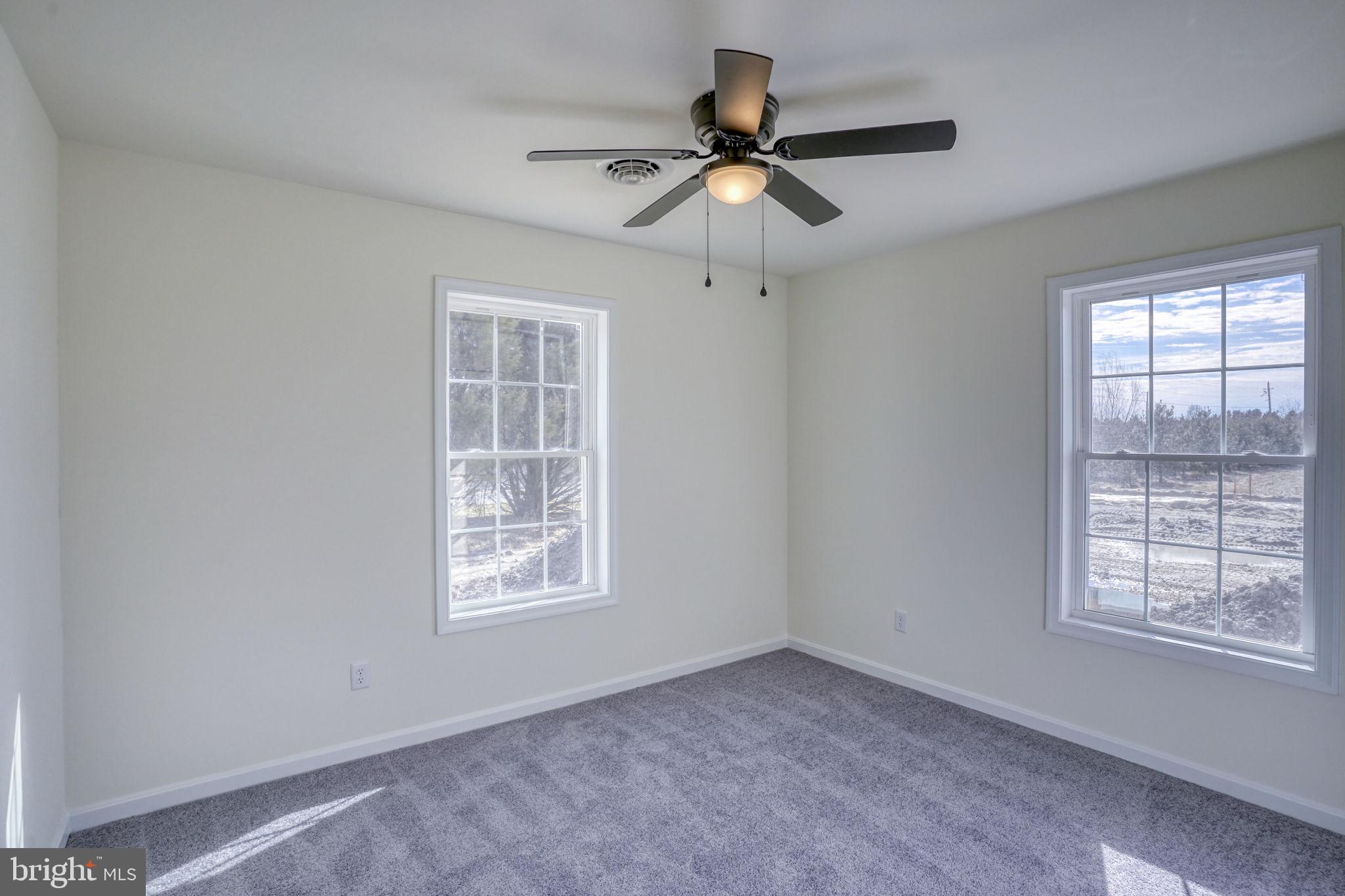 11064 North Union Church Road Lincoln, DE 19960 - Photo 26 of 35 a view of a livingroom with a ceiling fan and window