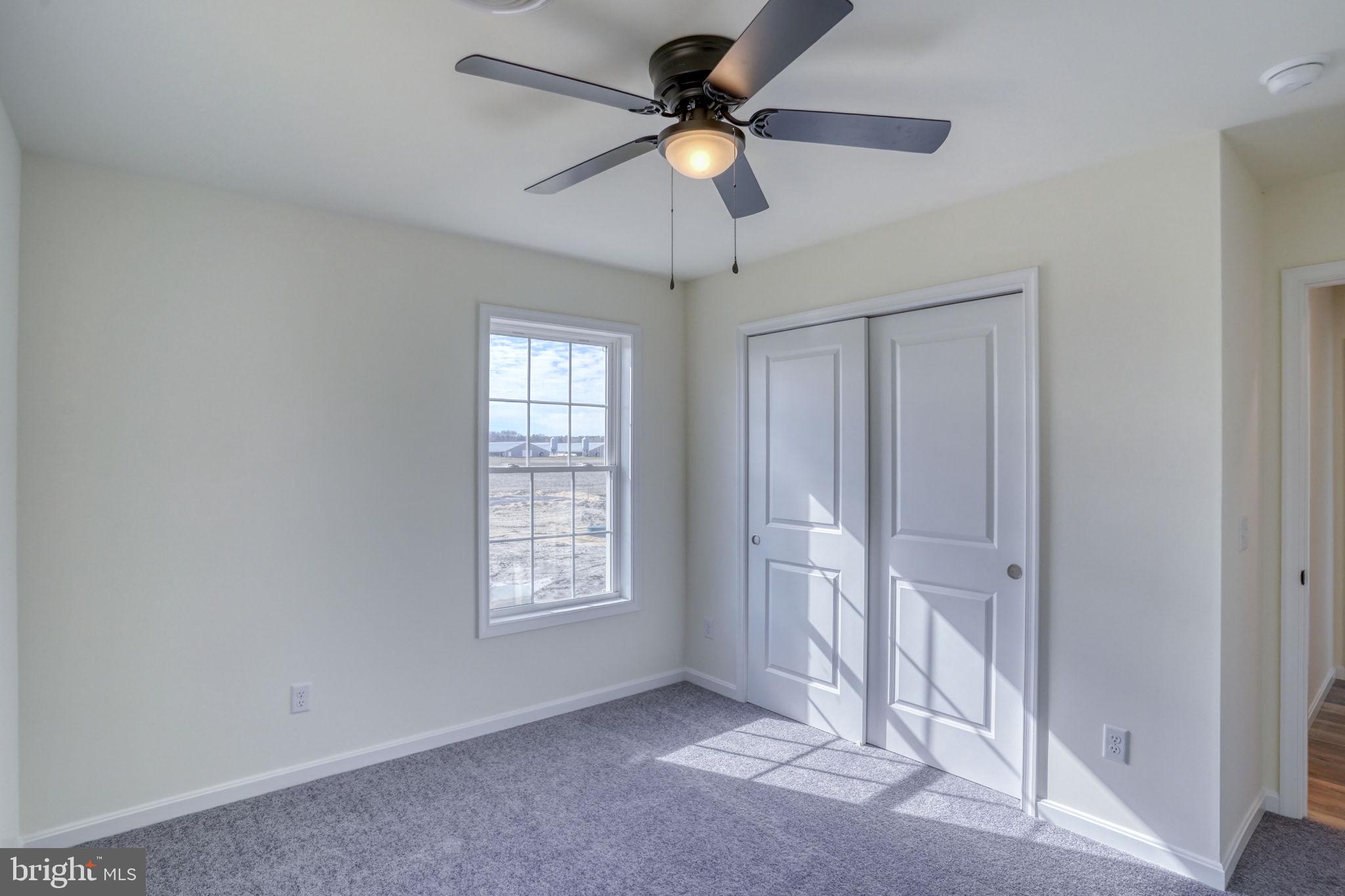 11064 North Union Church Road Lincoln, DE 19960 - Photo 27 of 35 wooden floor in an empty room with a window