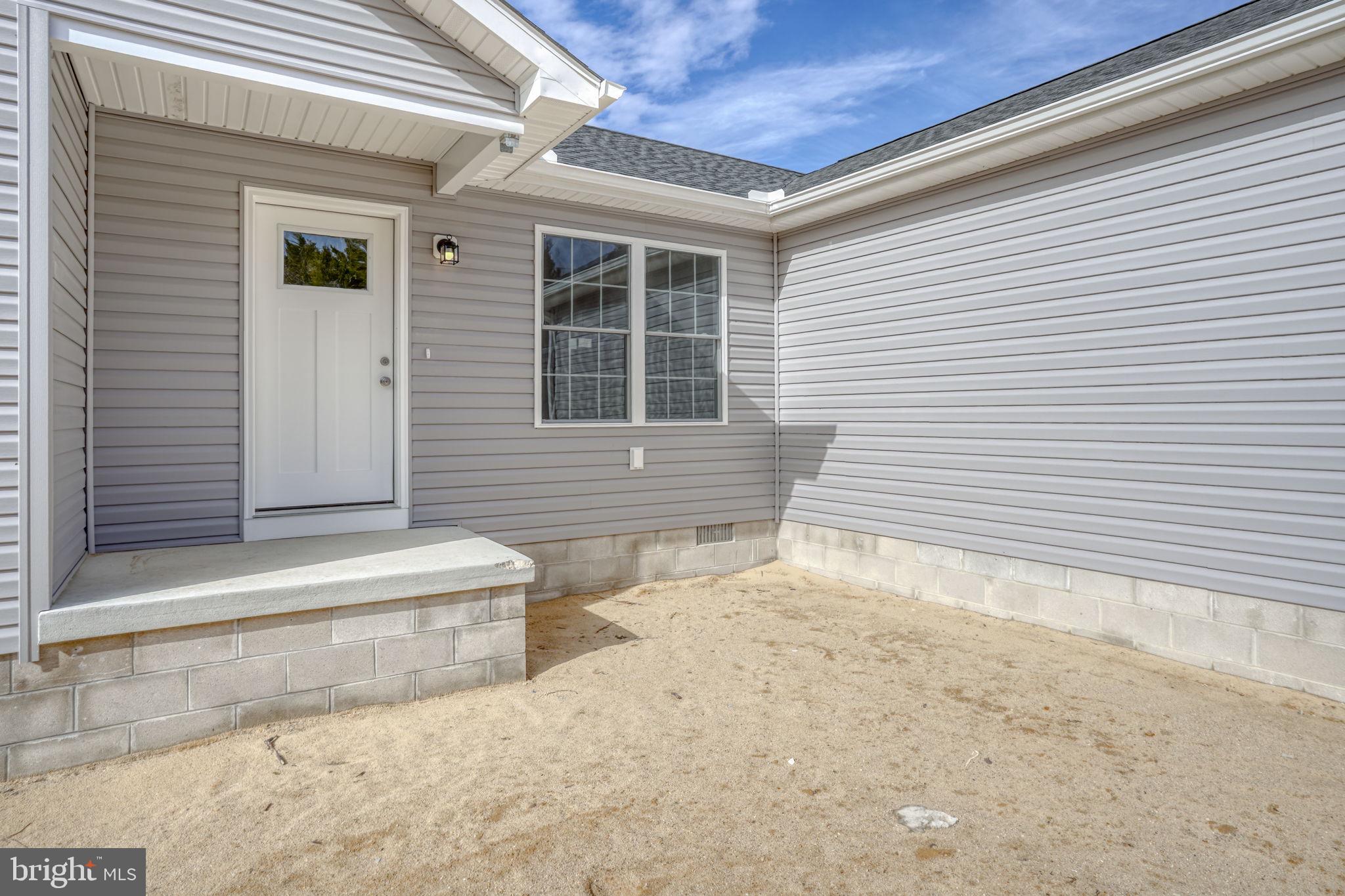 11064 North Union Church Road Lincoln, DE 19960 - Photo 9 of 35 a view of house with backyard and sitting area