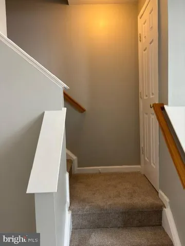 wooden floor and window in an empty room