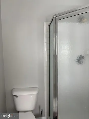 a view of a livingroom with wooden floor