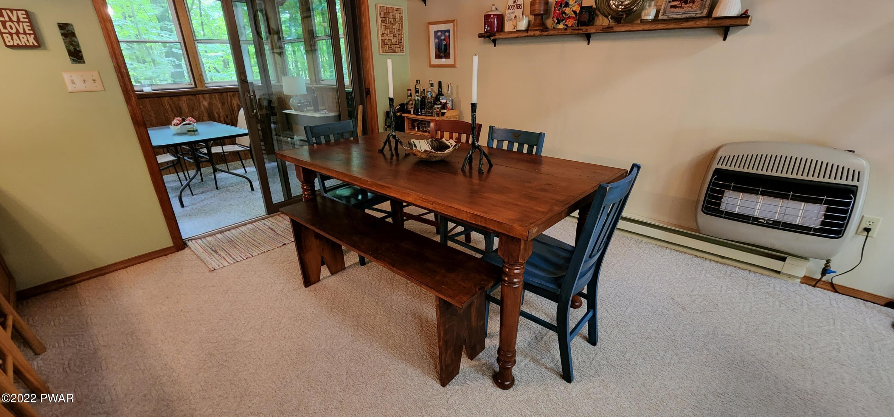 40 Boulder Road Lake Ariel, PA 18436 - Photo 21 of 52 a dining room with furniture and a floor to ceiling window