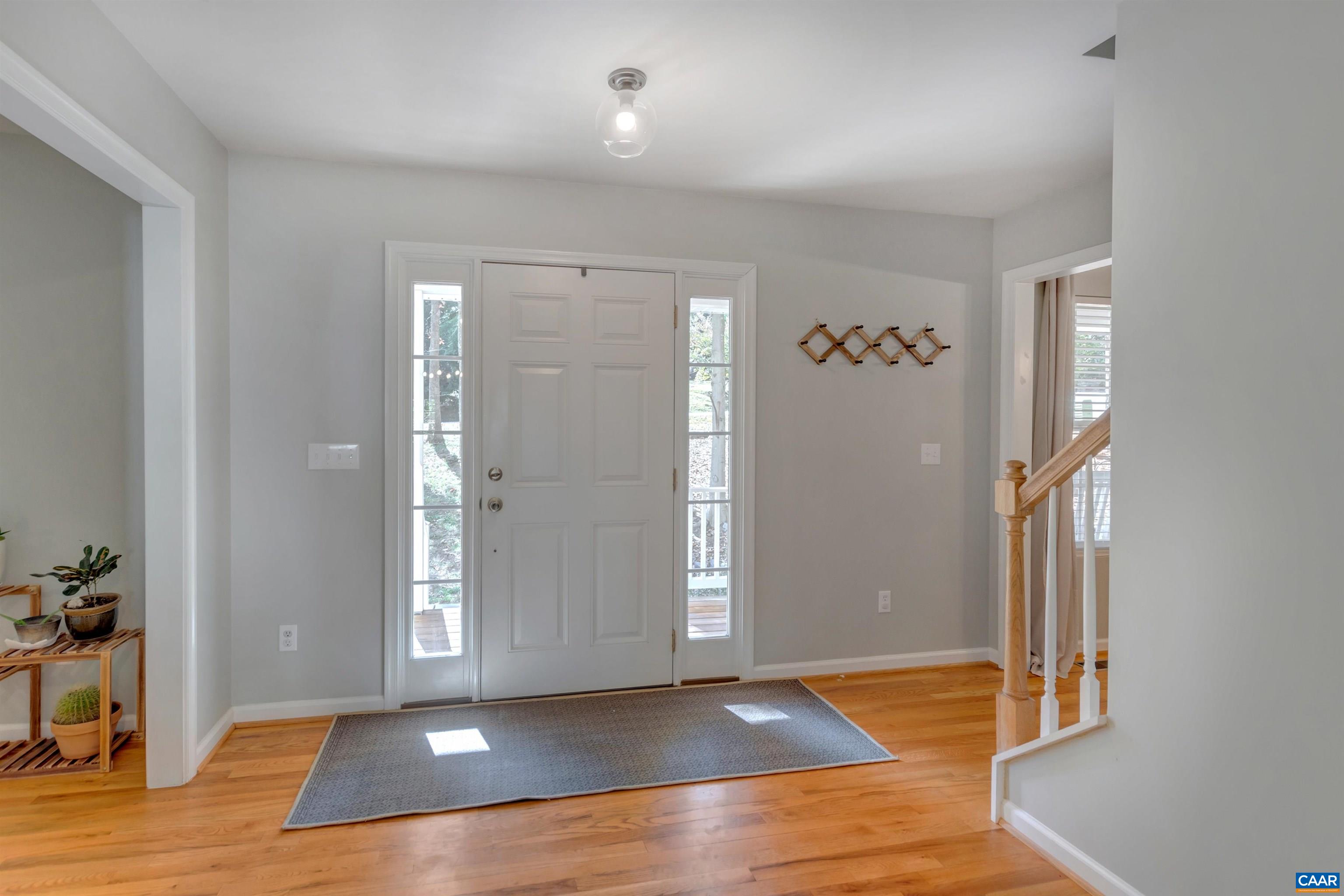 27 East Point Road Palmyra, VA 22963 - Photo 14 of 62 an empty room with wooden floor and windows