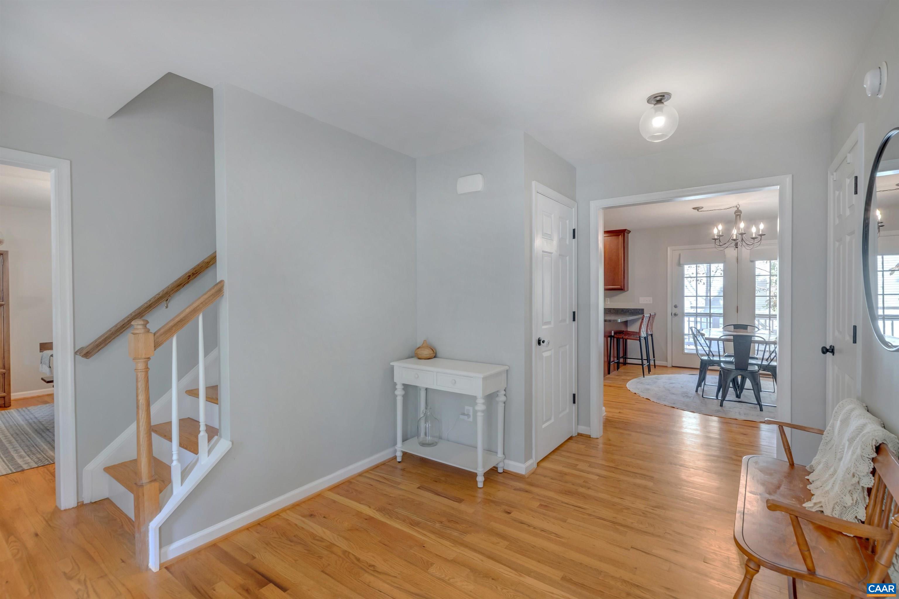 27 East Point Road Palmyra, VA 22963 - Photo 15 of 62 a view of an entryway with wooden floor and a livingroom view