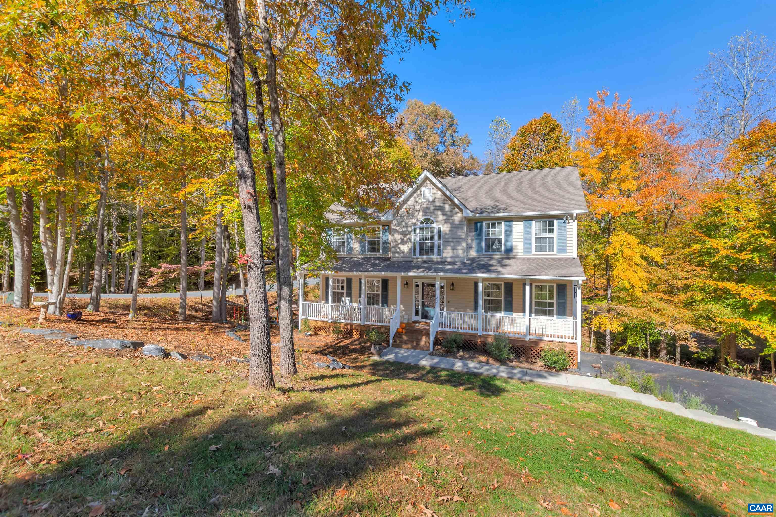 27 East Point Road Palmyra, VA 22963 - Photo 5 of 62 a view of a house with swimming pool and sitting area