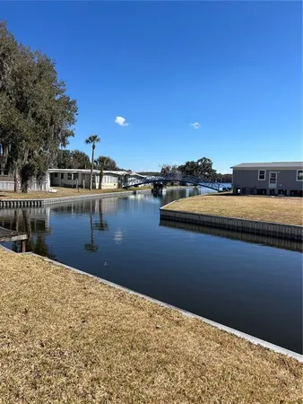 a view of a lake with outdoor space