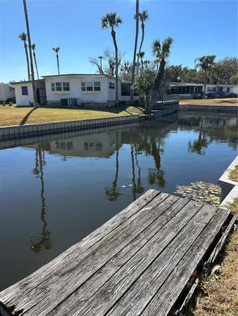 a view of swimming pool with a patio