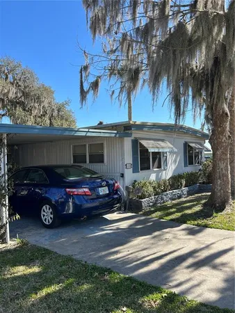 a car parked in front of a house