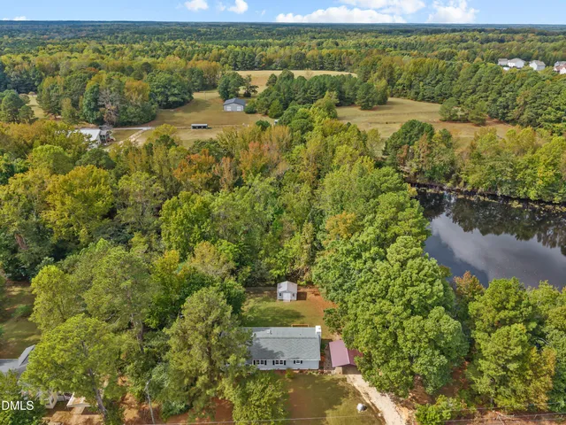 a view of a yard with an outdoor space