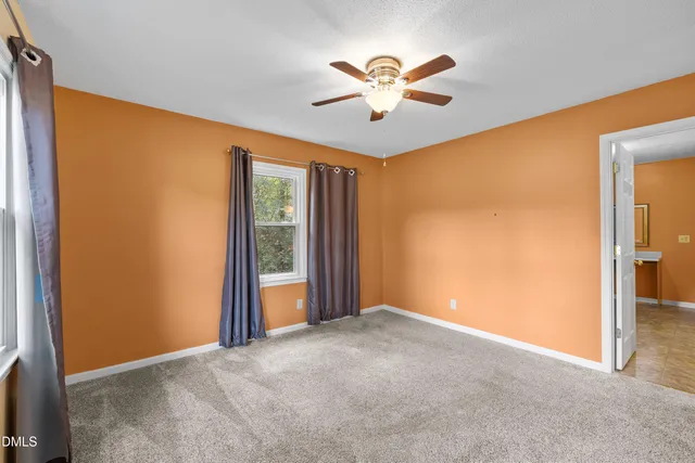 a view of empty room with painted walls