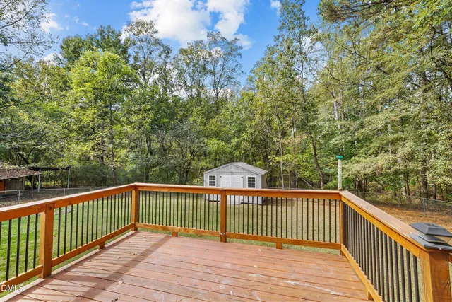 a view of a wooden roof deck