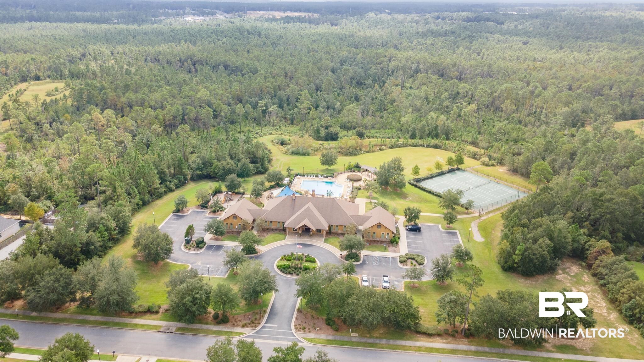 8664 Foxtail Loop Pensacola, FL 32526 - Photo 25 of 64 Aerial view of property and surrounding area with a forest