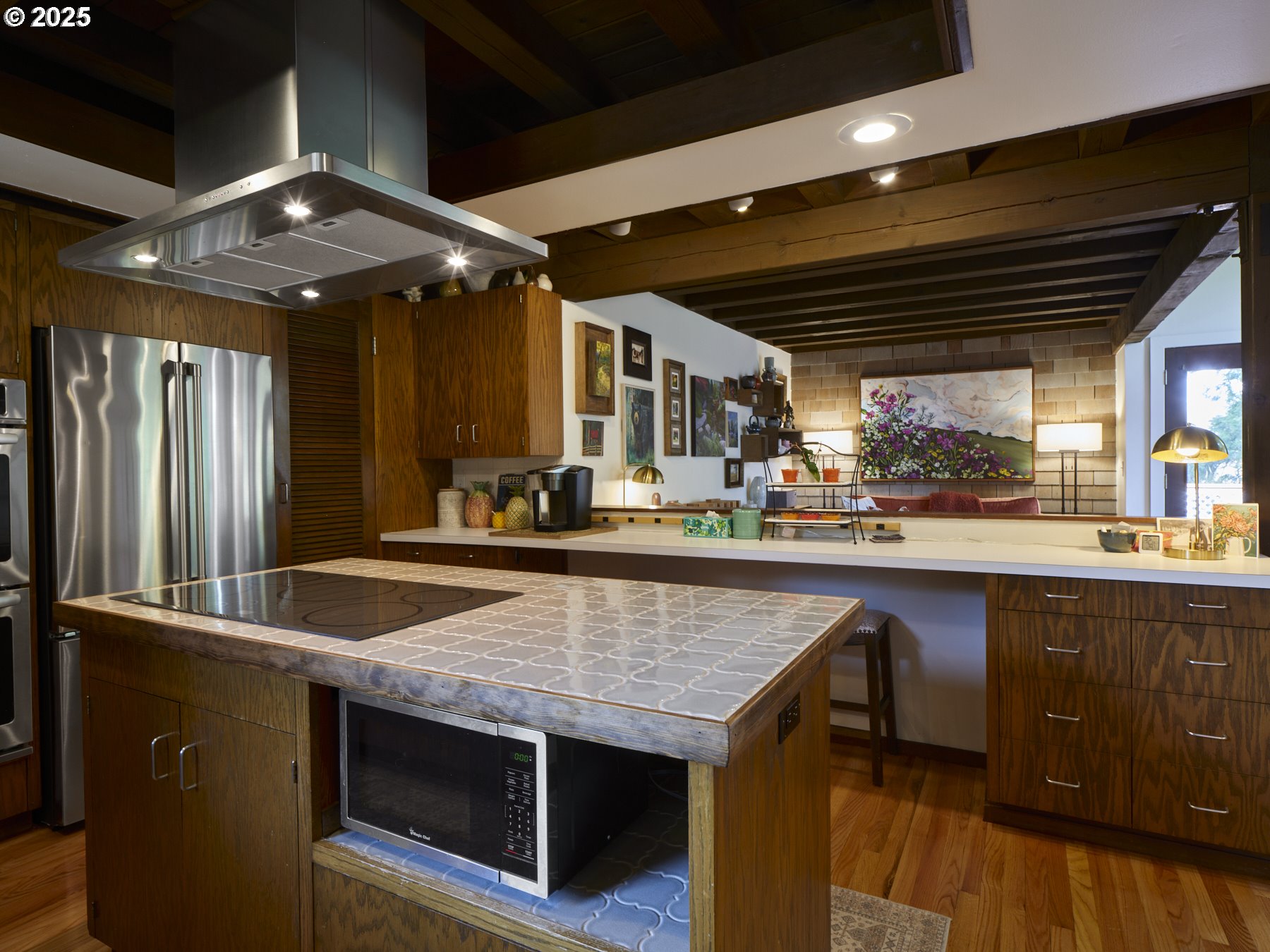 289 Classe Road Toledo, WA 98591 - Photo 15 of 48 a kitchen with stainless steel appliances granite countertop a sink a stove and a wooden floors