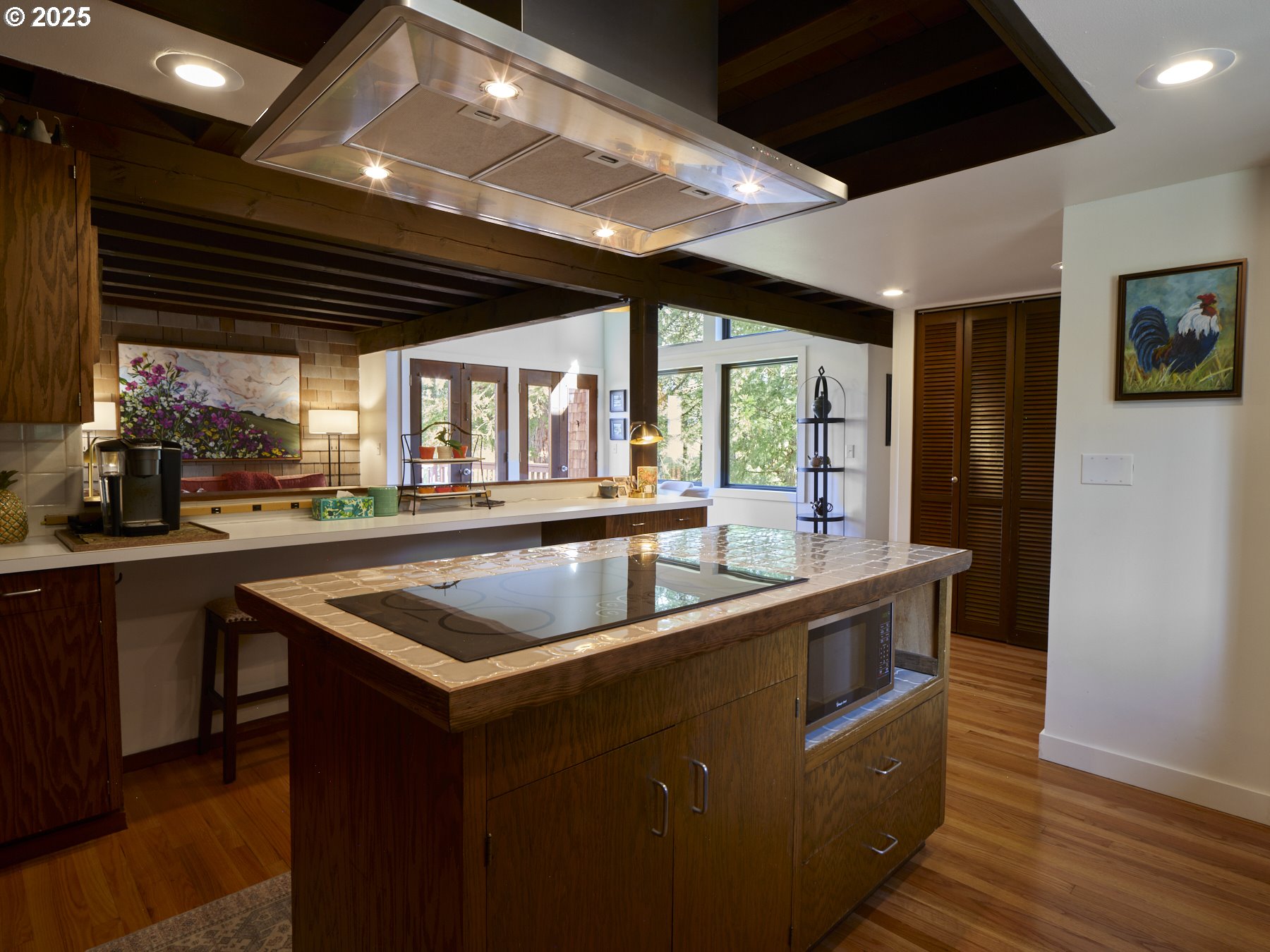 289 Classe Road Toledo, WA 98591 - Photo 16 of 48 a kitchen with stainless steel appliances granite countertop a sink a stove and a wooden floors